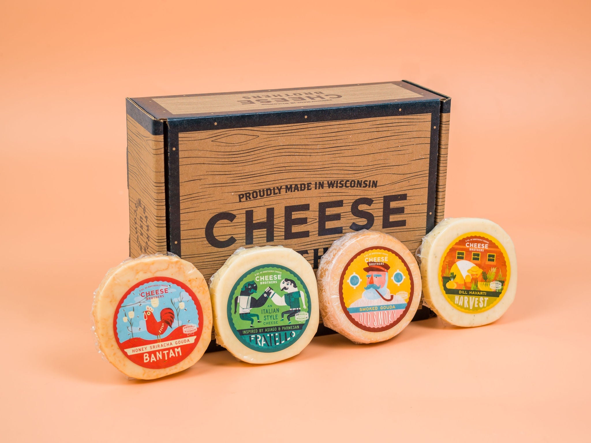 Wisconsin cheese sample box with a four packages of artisan cheeses.