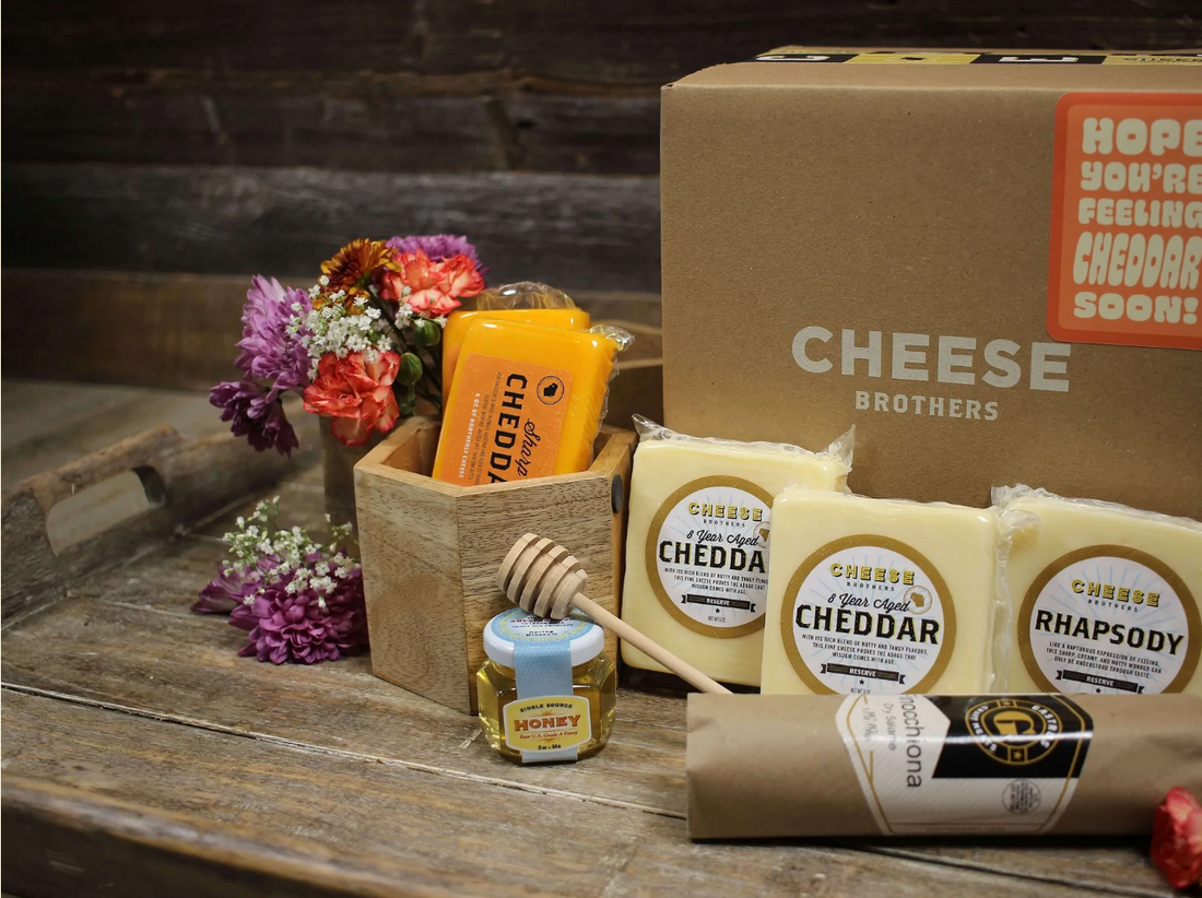 Get Well Soon cheese box with five blocks of gourmet Wisconsin cheese, honey, and sausage. 