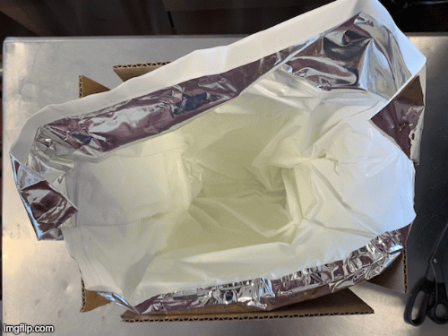 Gif with the layers inside of the Cheese Brothers delivery box. 