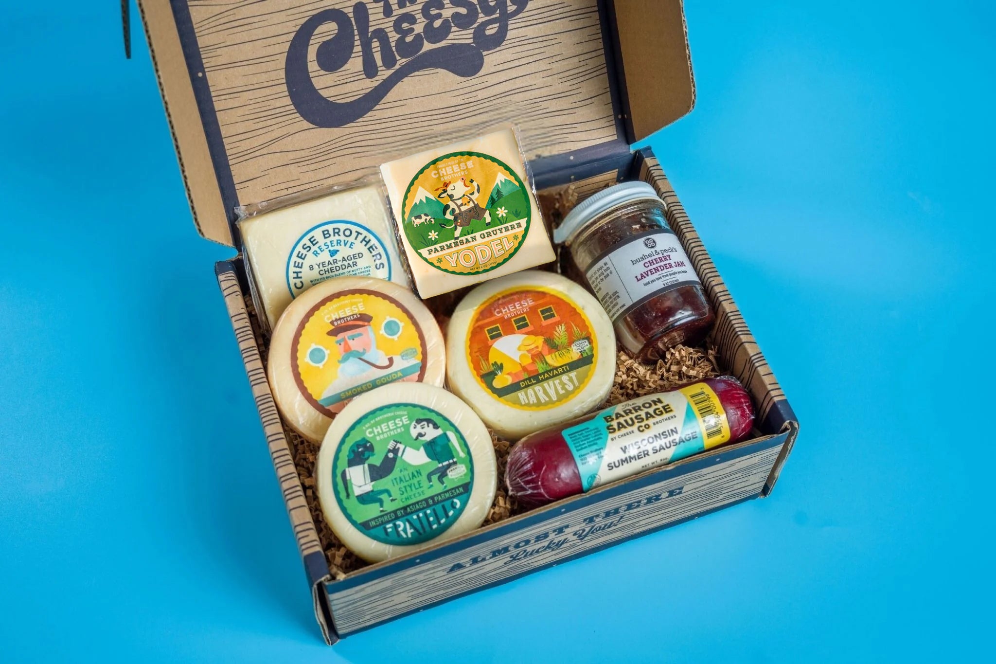 Cheese Bros Wisconsin charcuterie box with cheese, sausage and jam