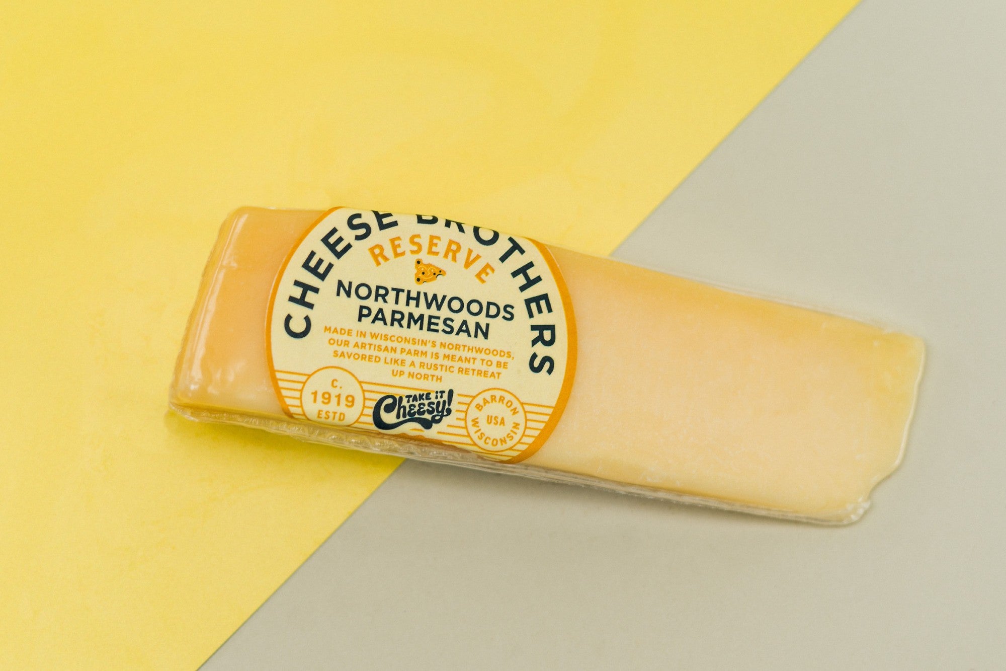 Wedge of gourmet Northwoods parmesan cheese.
