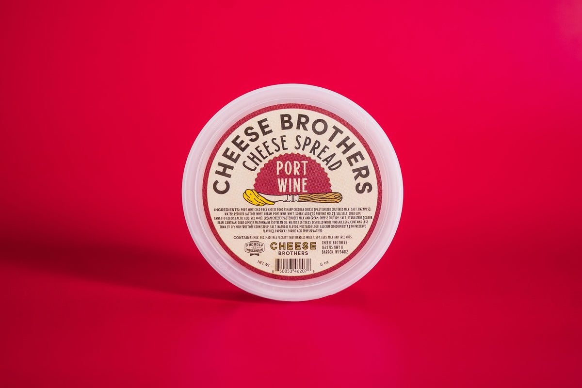 Container of port wine cheese spread. 