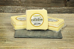 Packages of 8-year aged white cheddar. 