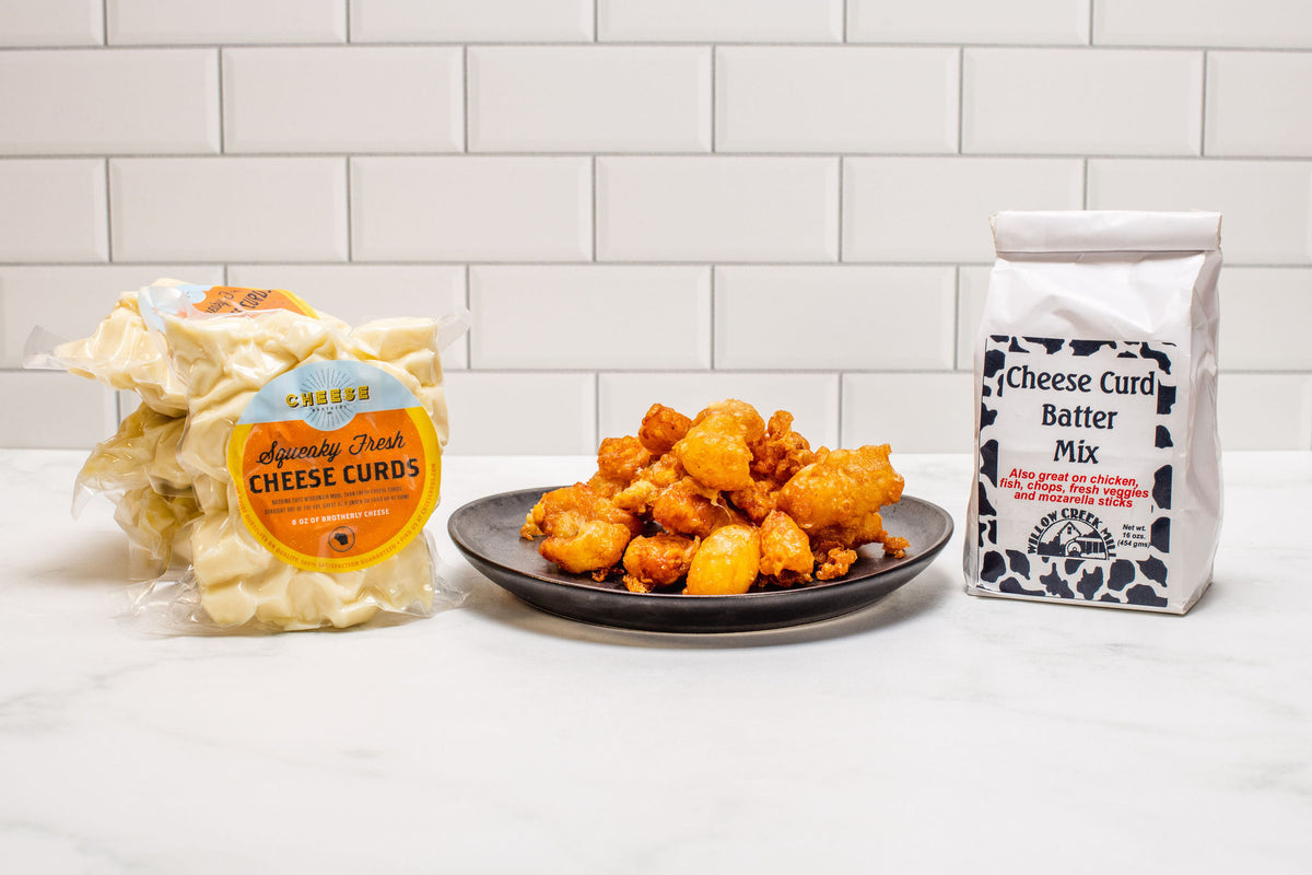 Packages of cheese curds, a plate of fried cheese curds, and a bag of cheese curd batter mix. 