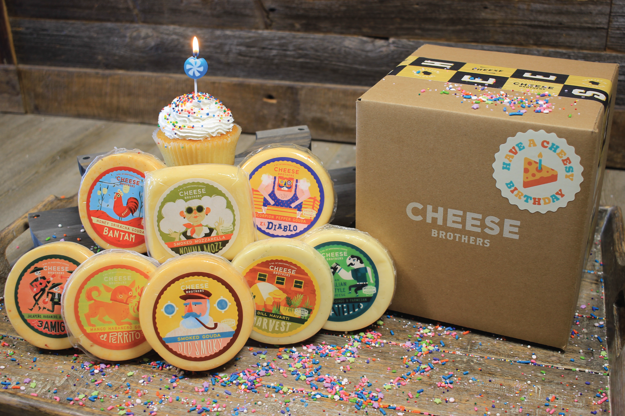 Birthday gift box with eight varieties of gourmet Wisconsin cheeses.