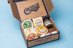 Fathers Day gift box with five varieties of gourmet Wisconsin cheeses, mustard, and salami. 