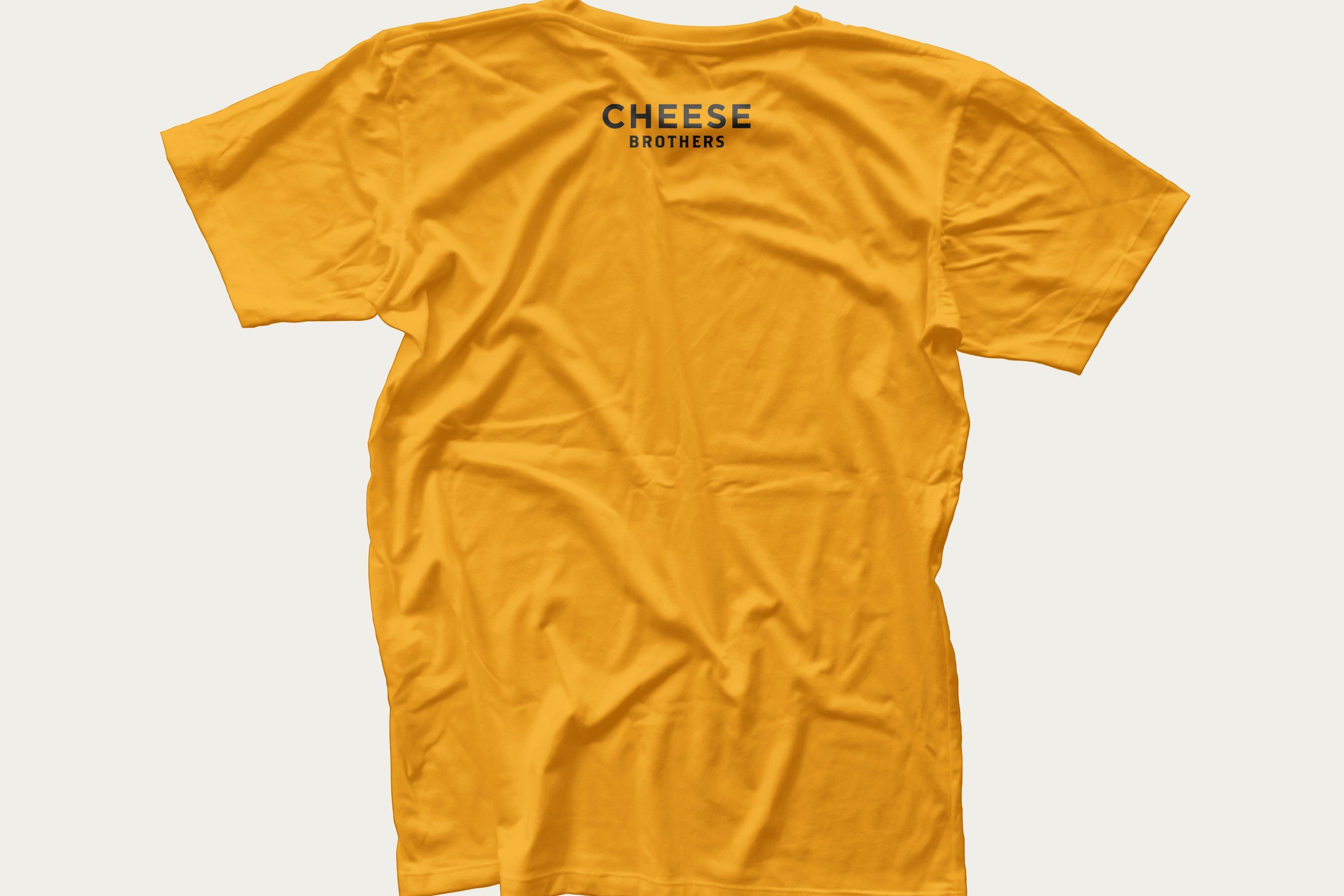 Back of take it cheesy yellow t-shirt